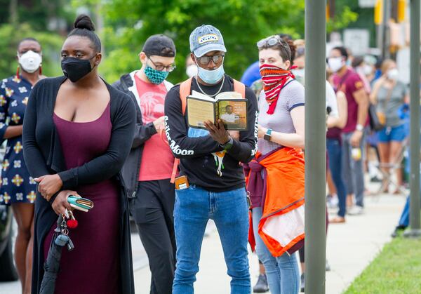 Voters wait in a long line June 9, 2020, at the Metropolitan Library in Atlanta to vote in Georgia's presidential primary. The primary was delayed twice that year because of the coronavirus pandemic. (Steve Schaefer/Atlanta Journal-Constitution/TNS)