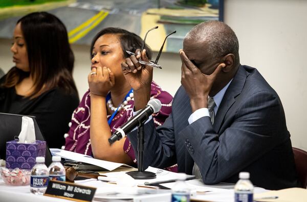 Mayor Bill Edwards reacts during a hearing to remove Edwards and councilwoman Helen Zenobia Willis (R) from office at the South Fulton City Hall, Dec. 30, 2019. STEVE SCHAEFER / SPECIAL TO THE AJC