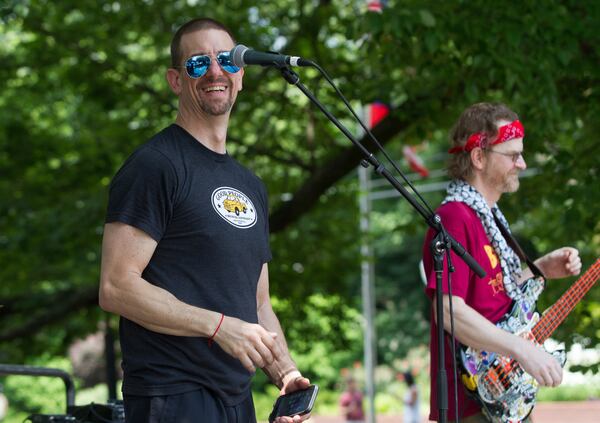 Mike Holley (left) introduces the first band at the start of the Bluesberry &  Beer Festival in Norcross. Ga., on Saturday, June 16, 2018. STEVE SCHAEFER / SPECIAL TO THE AJC