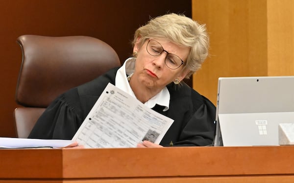  Fulton Superior Court Judge Jane Barwick goes over the booking report of former Atlanta police officer Garrett Rolfe during a bond hearing for Rolfe via Zoom on Tuesday, June 30, 2020. (Hyosub Shin / Hyosub.Shin@ajc.com)