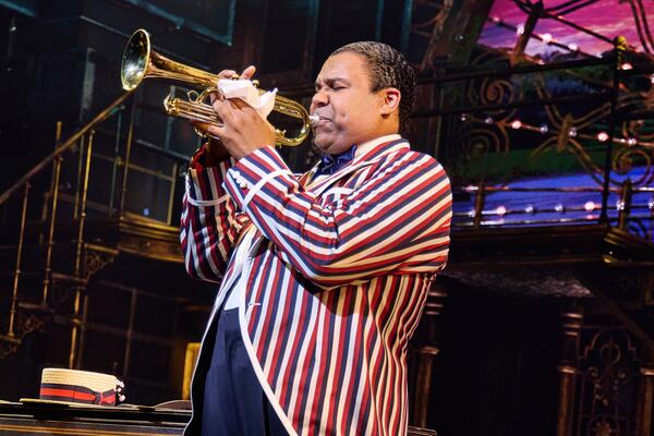 James Monroe Iglehart portrays Louis Armstrong during a performance in "A Wonderful World: The Louis Armstrong Musical" in New York. (Jeremy Daniel via AP)