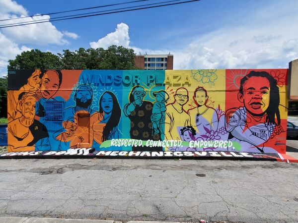 Charity Hamidullah's mural in Mechanicsville has a message: "Guns Down." Photo: Arthur Rudick/Streetartmap.org