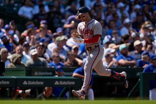 Atlanta Braves' Jarred Kelenic runs the bases after hitting a home run during the fifth inning of a baseball game against the Chicago Cubs, Thursday, May 23, 2024, in Chicago. (AP Photo/Erin Hooley)