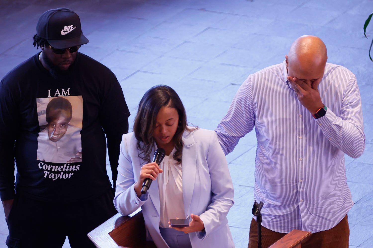 Darlene Chaney, cousin of Cornelius Taylor, speaks during the funeral service as his brother Derek Chaney reacts at Ebenezer Baptist Church on Monday, February 3, 2025.
(Miguel Martinez/ AJC)