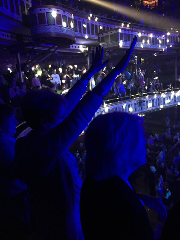 The Glamberts in front of me were from Chattanooga and have seen him numerous times. As you can see, they may have been forced to sit for a bit but you can't keep a good Glambert down! CREDIT: Rodney Ho/ rho@ajc.com