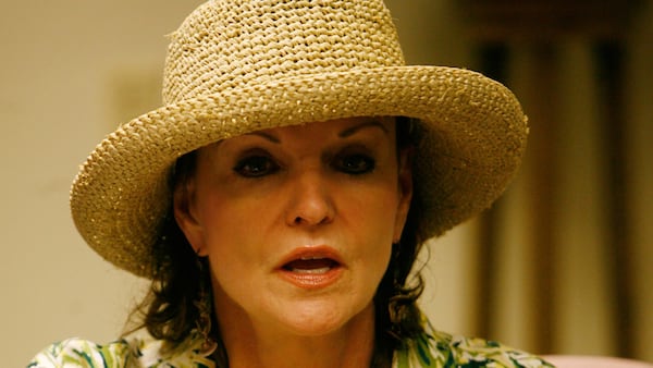 In this July 2010 file photo, Diane McIver, CEO of Corey Airport Services, responds to the media in a press conference in Atlanta.  AJC file photo