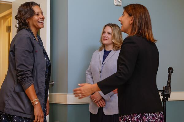 (Left to right) Dr. Deneta Sells, a physician and founder of Intown Pediatrics greets Deputy Secretary of Health and Human Services Andrea Palm and Centers for Disease Control and Prevention director Mandy Cohen before touring the facility in Atlanta on Wednesday, Aug. 28, 2024. (Natrice Miller/ AJC)