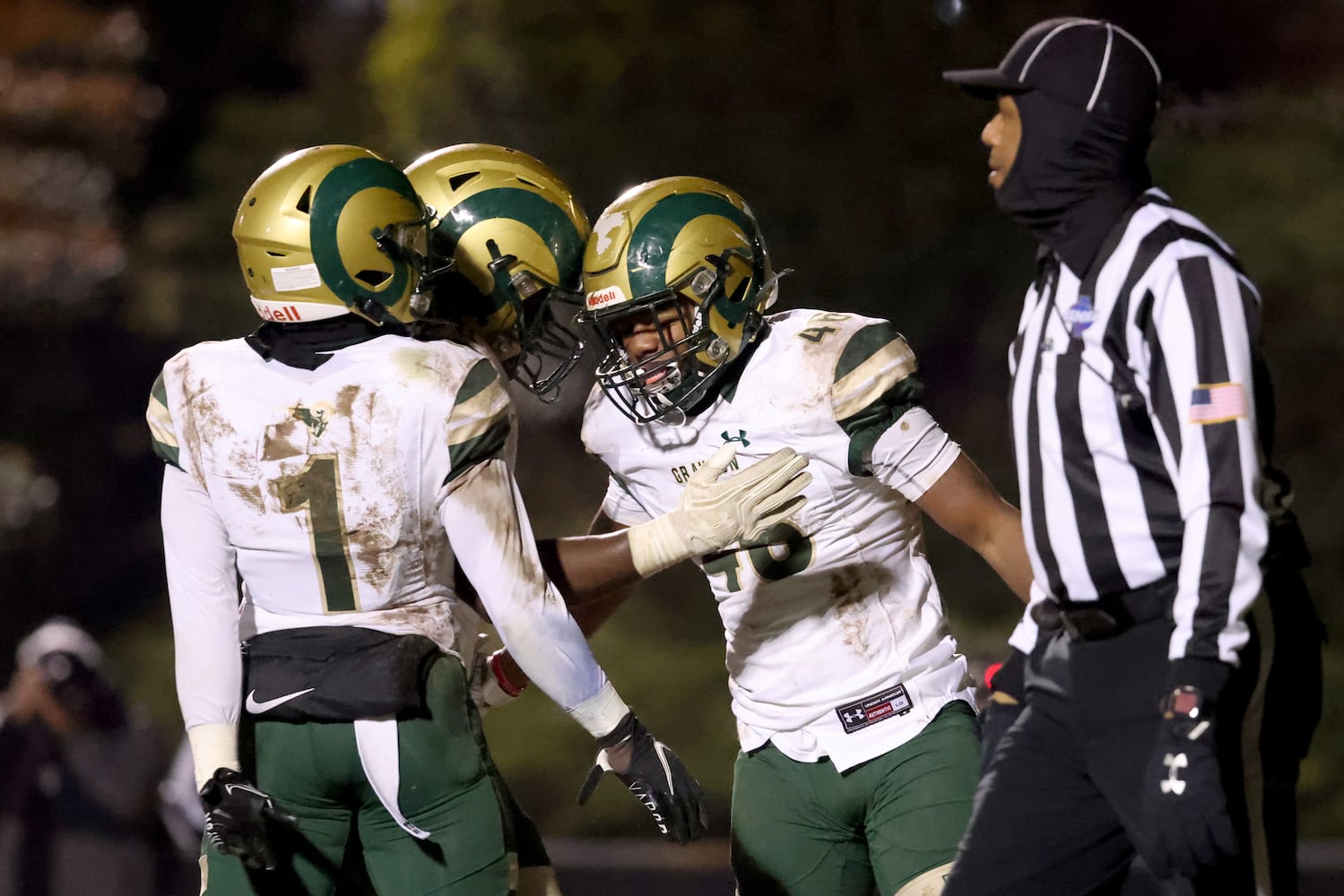 Dec. 18, 2020 - Norcross, Ga: Grayson running back Sean Downer (46, right) celebrates his rushing touchdown with teammates in the second half against Norcross in the Class AAAAAAA semi-final game at Norcross high school Friday, December 18, 2020 in Norcross, Ga.. Grayson won 28-0 to advance to the Class AAAAAAA finals. JASON GETZ FOR THE ATLANTA JOURNAL-CONSTITUTION