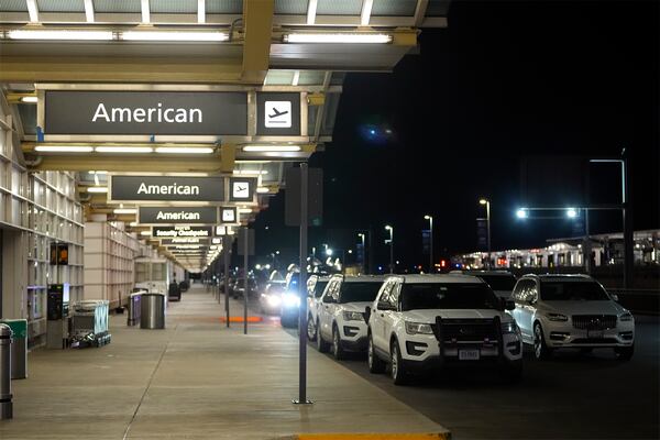 Law enforcement vehicles are parked at Ronald Reagan Washington National Airport, Wednesday, Jan. 29, 2025, in Arlington, Va. (AP Photo/Julio Cortez)