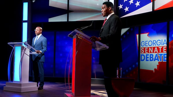 Sen. Raphael Warnock (D-Ga.) and Georgia Republican Senate candidate Herschel Walker participate in the Nexstar Georgia Senate Debate at District Live at Plant Riverside District in Savannah, Ga., on Friday, October 14, 2022.