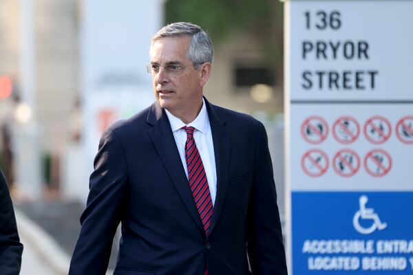 Georgia Secretary of State Brad Raffensperger enters the Fulton County Courthouse to testify to a special purpose grand jury involving the probe into whether former President Donald Trump and others tried to improperly overturn the 2020 election Thursday, June 2, 2022, in Atlanta. (Jason Getz / Jason.Getz@ajc.com)