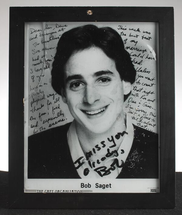 A signed photo of Bob Saget at the Punchline. (Chris Hunt / AJC staff)