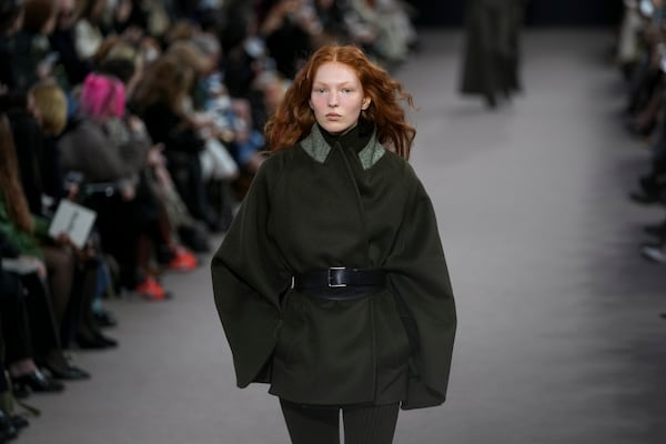 A model wears a creation as part of the Max Mara Fall/Winter 2025-2026 Womenswear collection presented in Milan, Italy, Thursday, Feb. 27, 2025. (AP Photo/Antonio Calanni)