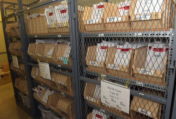 Rape kits are shown in the secure vault at the Georgia Bureau of Investigation. KENT D. JOHNSON/KDJOHNSON@AJC.COM