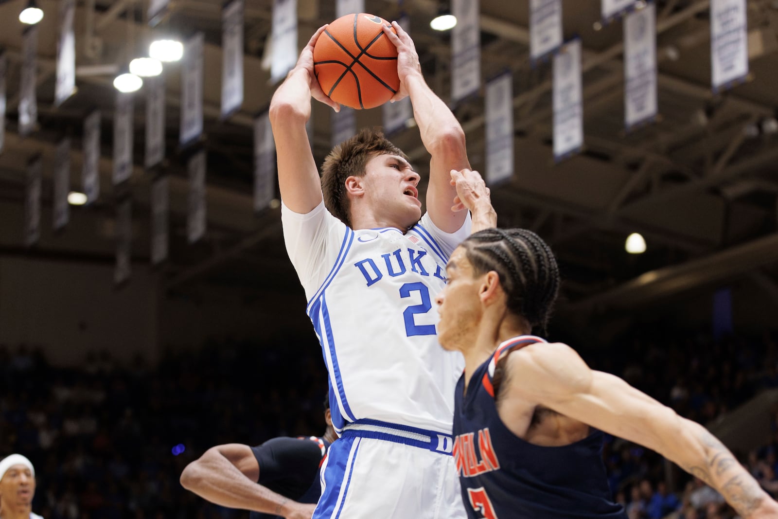 Duke's Cooper Flagg (2) drives during the first half of an exhibition NCAA college basketball game against Lincoln in Durham, N.C., Saturday, Oct. 19, 2024. (AP Photo/Ben McKeown)