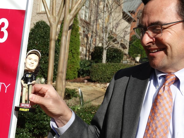 Jimmy Baron in 2015 with a 99X bobblehead of himself. RODNEY HO/rho@ajc.com