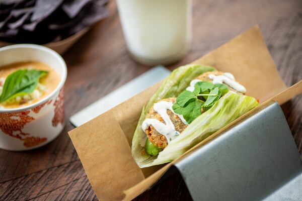 Falafel taco with tahini crema, arugula, tomato, pickled fresnos, avocado, pickled red onion, pea tendrils, and lettuce wrap. Photo credit- Mia Yakel.