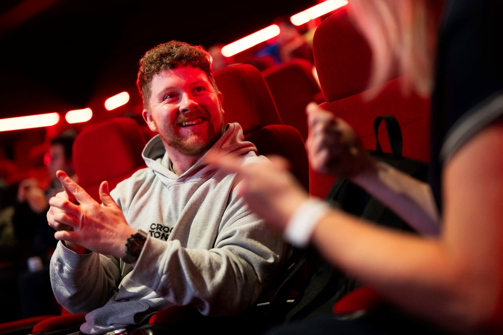 Front of house cinema staff learn British Sign Language at Cineworld Leicester Square, on Wednesday, Oct. 2, 2024 in London. (Photo by Scott A Garfitt/Invision/AP)