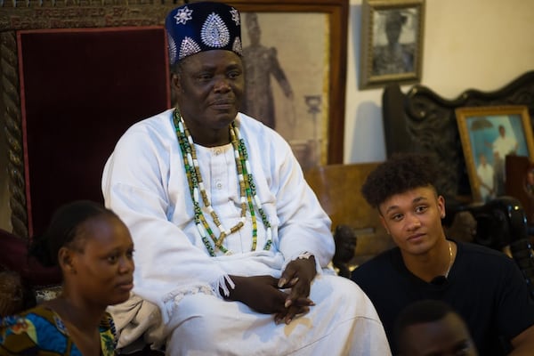 Kieron Christian Graham, far right, with King Toffa IX of Porto-Novo. Graham was a DNA match with Christine Bakonle, who is one of the King’s daughters.