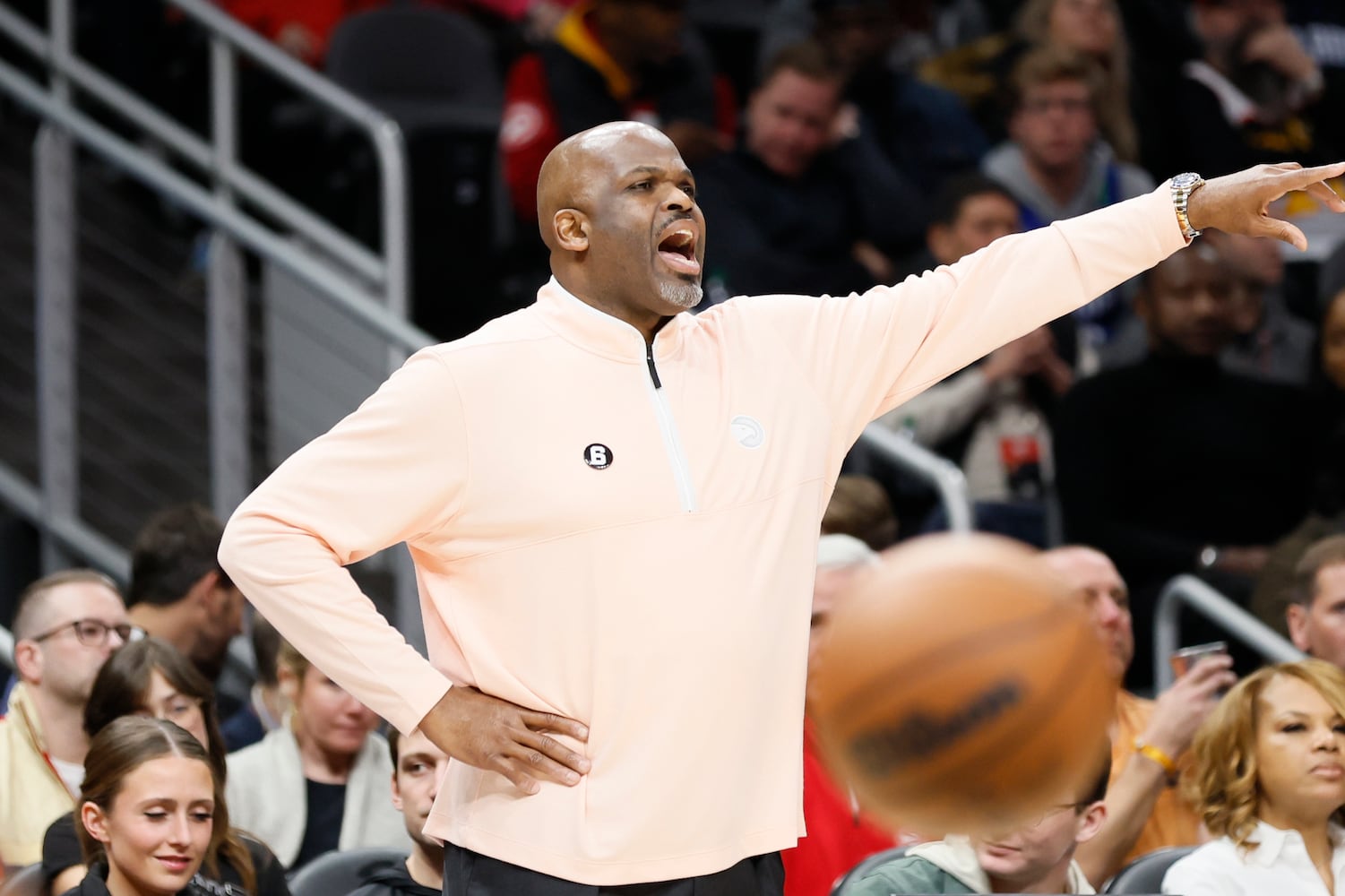 Hawks coach Nate McMillan directs his players during the second half against the Magic on Monday night in Atlanta.  (Miguel Martinez / miguel.martinezjimenez@ajc.com)