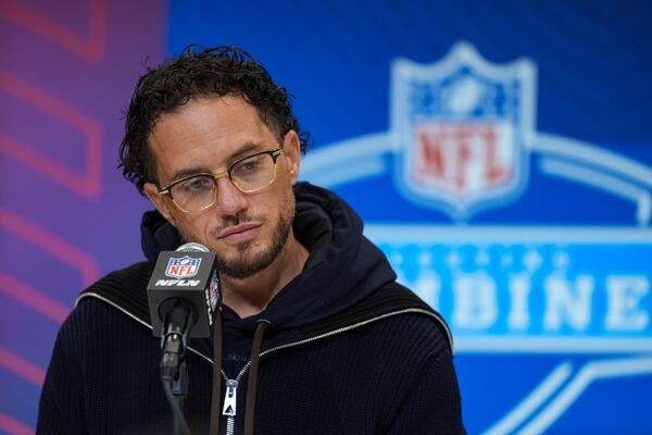 Miami Dolphins head coach Mike McDaniel speaks during a press conference at the NFL football scouting combine in Indianapolis, Tuesday, Feb. 25, 2025. (AP Photo/Michael Conroy)