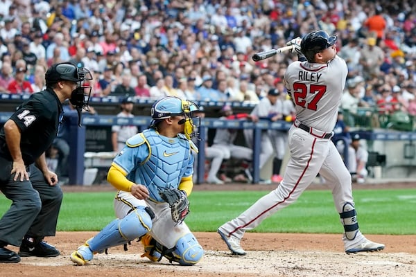 Atlanta Braves' Austin Riley hits a two-run home run during the third inning of a baseball game against the Milwaukee Brewers Friday, July 21, 2023, in Milwaukee. (AP Photo/Morry Gash)