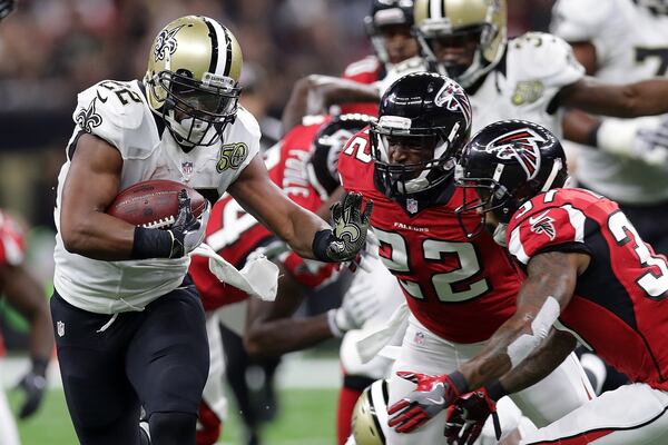 NEW ORLEANS, LA - SEPTEMBER 26: Mark Ingram #22 of the New Orleans Saints is tackled by Keanu Neal #22 of the Atlanta Falcons at the Mercedes-Benz Superdome on September 26, 2016 in New Orleans, Louisiana. (Photo by Chris Graythen/Getty Images)