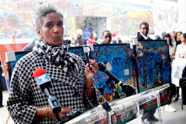 Love speaks at the unveiling of Louis Delsarte's mural in honor of Martin Luther King Jr. outside the MLK Jr. National Historic Site's visitors center in 2010.