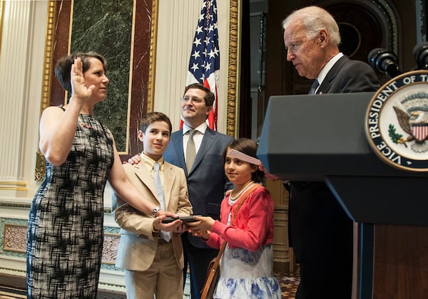 Vice President Joe Biden swears in Suzi LeVine as the U.S. Ambassador to Switzerland and Liechtenstein in 2014. (U.S. State Dept.)