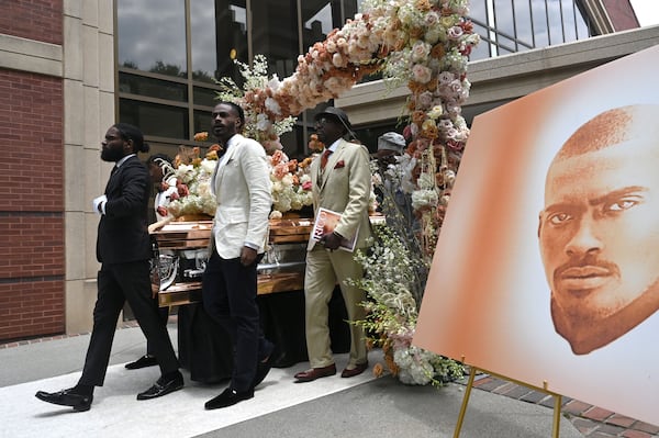 The casket of Rico Wade is carried out following his funeral service at Ebenezer Baptist Church on Friday, April 26, 2024. Rico Wade, an architect of Southern Hip Hop and one-third of the Grammy-nominated, multi-platinum-selling legendary production team Organized Noize and the de facto leader of The Dungeon Family, will be eulogized privately and by invitation only for family and friends on Friday, April 26, 2024. (Hyosub Shin / AJC)