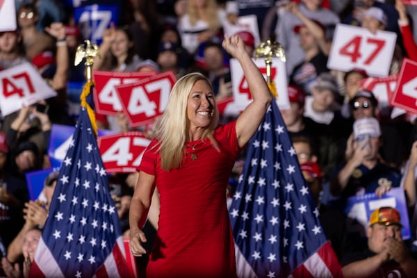 U.S. Rep. Marjorie Taylor Greene, R-Rome, walks on stage at Republican presidential candidate Donald Trump’s rally at McCamish Pavilion at Georgia Tech in Atlanta on Monday, October 28, 2024. (Arvin Temkar / AJC)