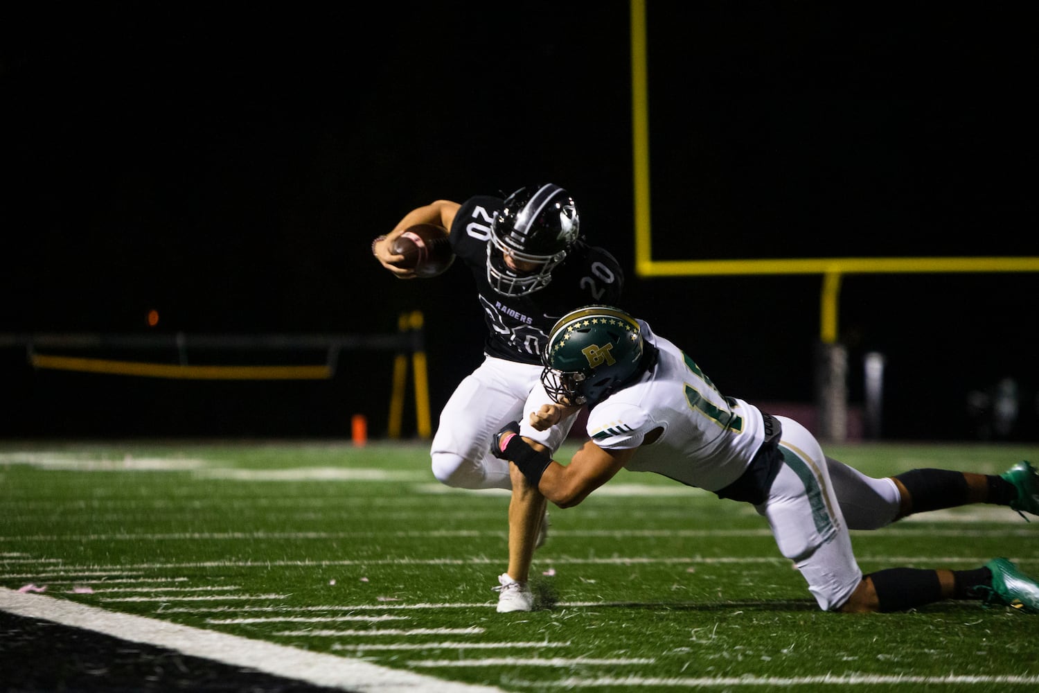 Jack Yeager, middle linebacker for Alpharetta, runs the ball during the Alpharetta vs. Blessed Trinity high school football game on Friday, October 28, 2022, at Alpharetta high school in Alpharetta, Georgia. Alpharetta led Blessed Trinity 21-7 at the end of the first half.