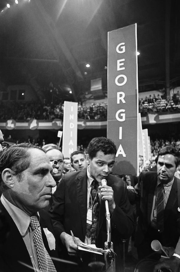 At age 28, Julian Bond was too young to serve as vice president when he was nominated by the Wisconsin delegation at the 1968 Democratic National Convention in Chicago. But Bond hoped he would be able to speak about the issues he told CBS correspondent Dan Rather “weren’t being discussed ... poverty, racism, war.” (AP Photo)