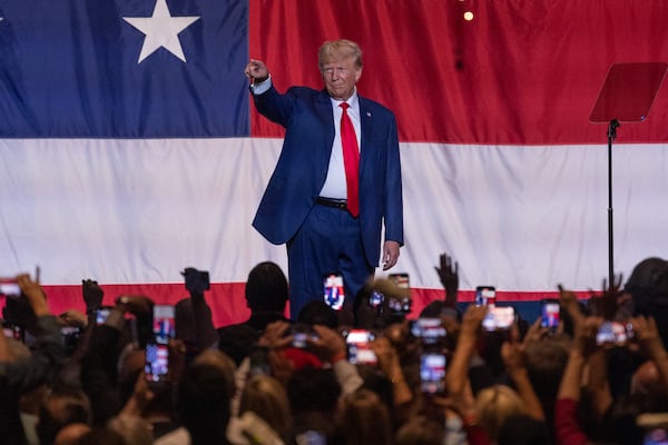 Former President Donald Trumps waves to supporters before speaking during the GOP Convention at the Columbus Georgia Convention & Trade Center on Saturday, June 10, 2023. Fulton Superior Court Judge Scott McAfee has been assigned to oversee the case against Trump and 18 co-defendants, (Natrice Miller/natrice.miller@ajc.com)