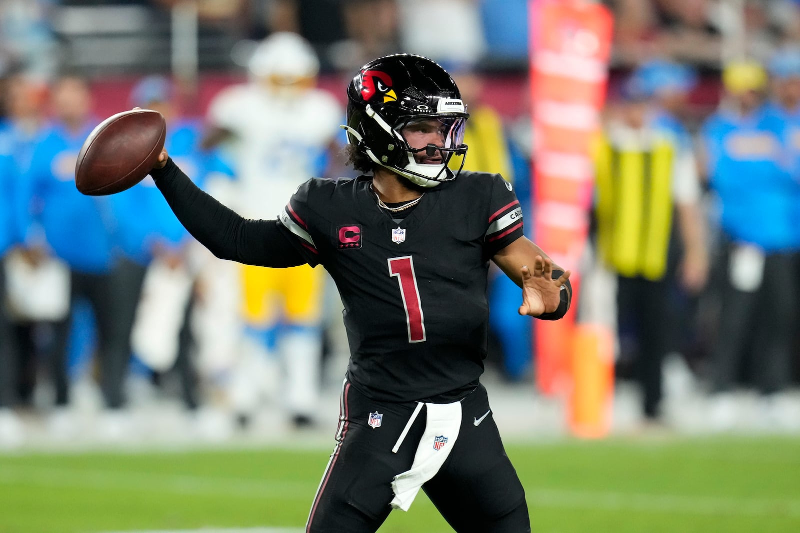 Arizona Cardinals quarterback Kyler Murray throws a pass during the first half of an NFL football game against the Los Angeles Chargers, Monday, Oct. 21, 2024, in Glendale Ariz. (AP Photo/Ross D. Franklin)