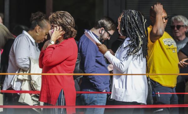 Left to right (foreground) Debbie Kilgore and Helena Davis. Left to right (background) Gayle Lewis, Ryan Meder and Lyle Hayes wait to vote on Thursday Oct. 18, 2018 at the Cobb County West Park Government Center JOHN SPINK/JSPINK@AJC.COM