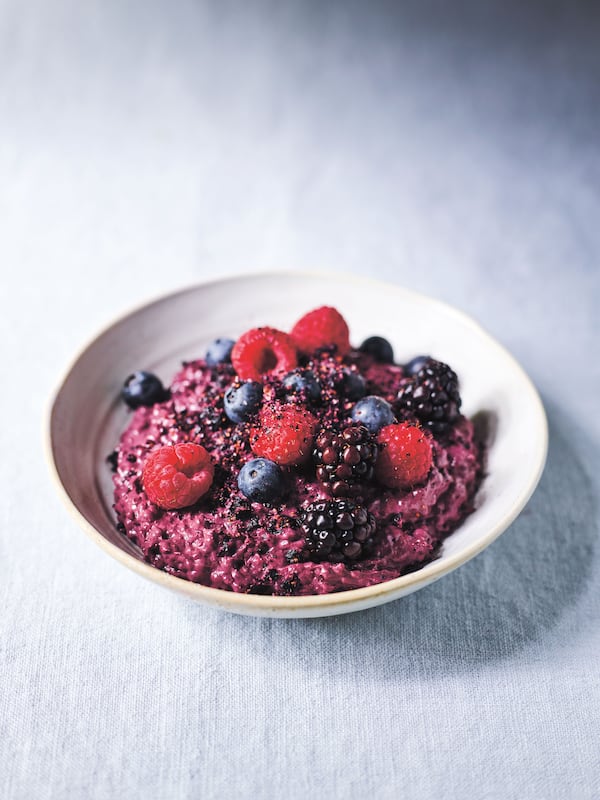 Chia seeds thicken cooked berries enriched with blended cashews and coconut butter in berry chia pudding. Courtesy of Anson Smart 