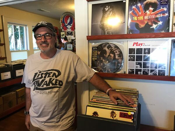 Rand Cabus, owner of Mojo Vinyl in Roswell. CREDIT: Rodney Ho/rho@ajc.com