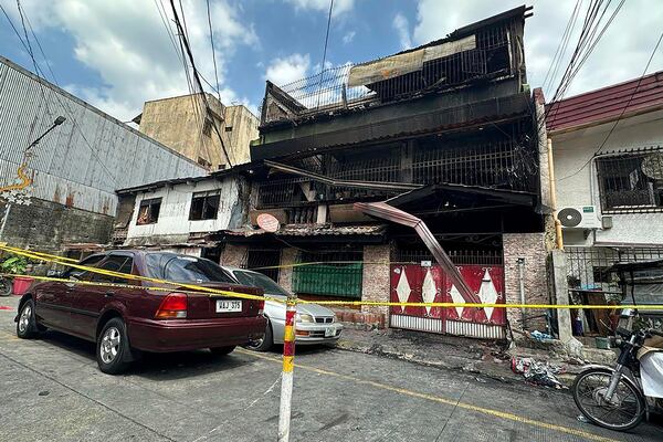 A building damaged by a fire stands in San Isidro Galas village in suburban Quezon city, Philippines Thursday, Feb. 27, 2025. (AP Photo/Joeal Calupitan)