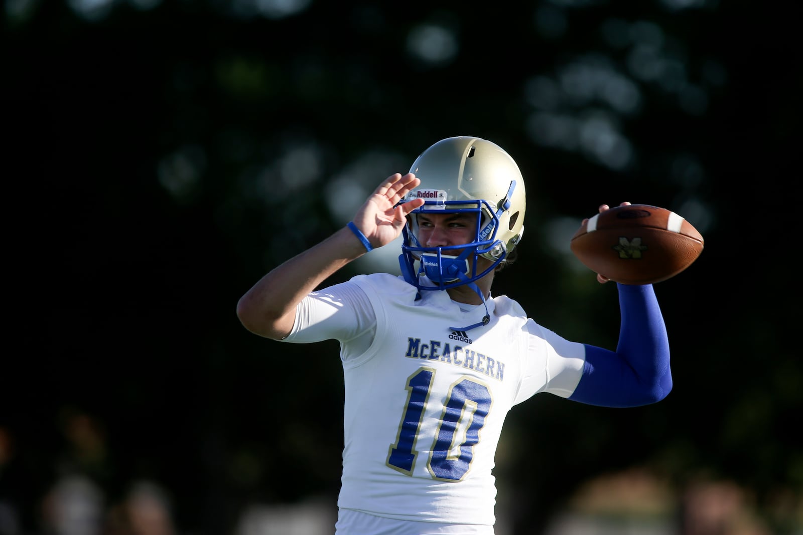 McEachern quarterback Bailey Hockman (1) warms up before their game against Buford on Sept. 5, 2014. (Jason Getz)