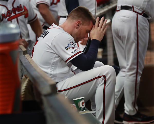 Braves first baseman Freddie Freeman sits dejected in the dugout in the 9th inning.    Curtis Compton/ccompton@ajc.com