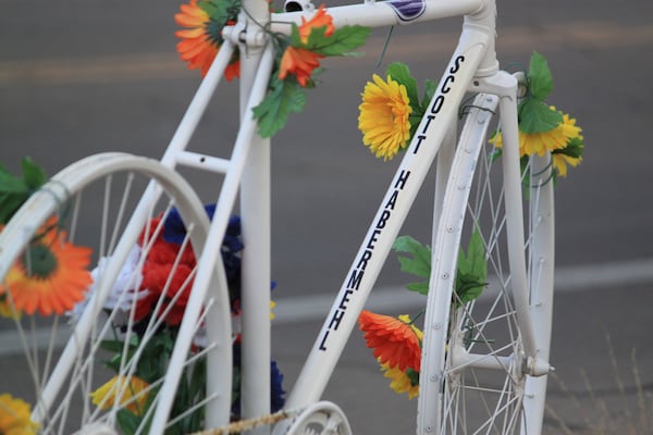 This March 20, 2025 photo shows a memorial ghost bike near the spot where Scott Dwight Habermehl was struck and fatally injured in May 2024 while biking to work at Sandia National Laboratories in Albuquerque, N.M. (AP Photo/Susan Montoya Bryan)