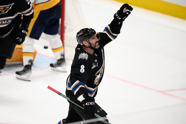 Washington Capitals left wing Alex Ovechkin (8) celebrates his goal during the third period of an NHL hockey game against the Nashville Predators, Wednesday, Nov. 6, 2024, in Washington. The Capitals won 3-2. (AP Photo/Nick Wass)