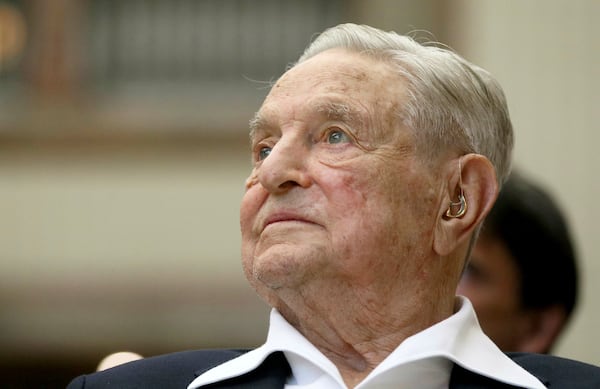 FILE - George Soros, founder and chairman of the Open Society Foundations, attends the Joseph A. Schumpeter award ceremony in Vienna, Austria, June 21, 2019. (AP Photo/Ronald Zak, File)