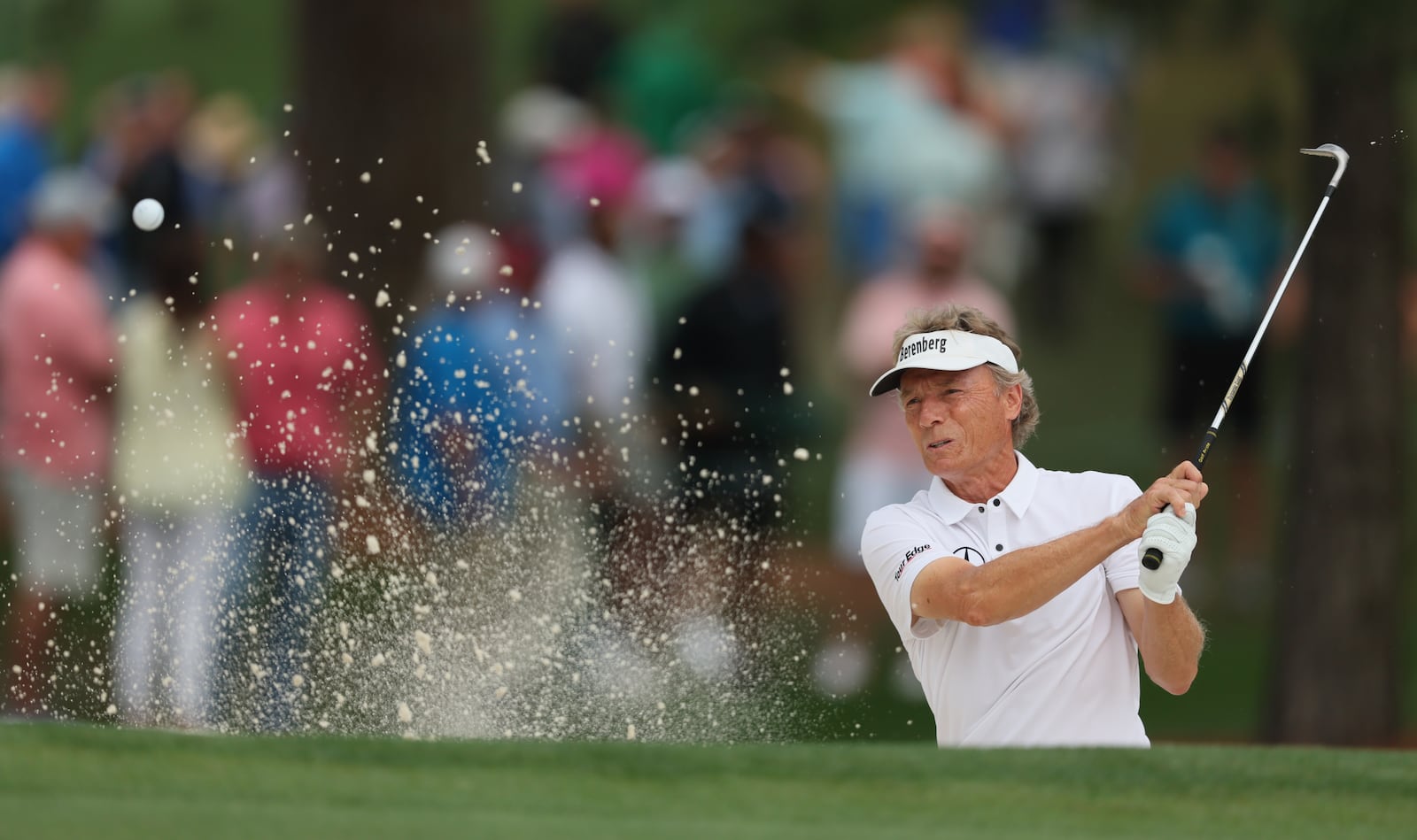 Bernhard Langer hits out of bunker on seventh hole during second round of the 2023 Masters Tournament at Augusta National Golf Club, Friday, April 7, 2023, in Augusta, Ga. (Jason Getz / Jason.Getz@ajc.com)
