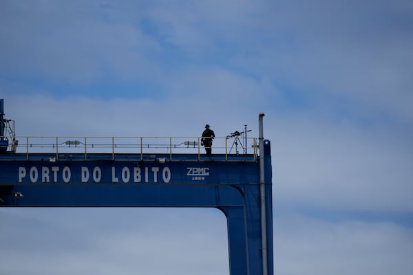 A sniper stands on a platform during President Joe Biden's tour of he Lobito Port Terminal in Lobito, Angola, on Wednesday, Dec. 4, 2024. (AP Photo/Ben Curtis)