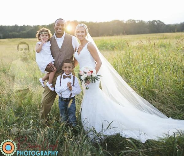 Anna Bozman and her family, including a photoshopped ghostly image of her late son Lake (left). CREDIT: Brandy Angel Photography