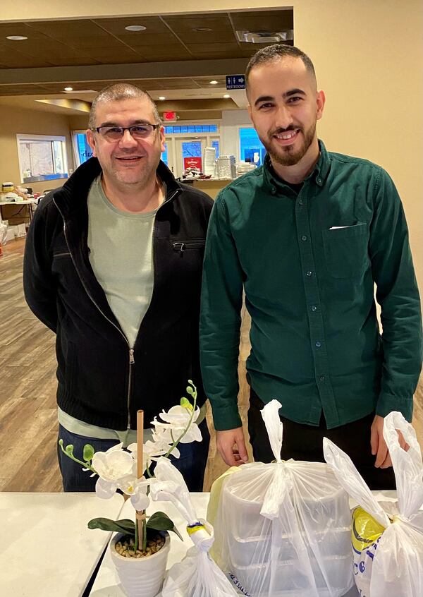 Kamel Fadavi (left) is the owner of Taaj Kabob & Grill, and Noushad Naderpour is the manager. Wendell Brock for The Atlanta Journal-Constitution