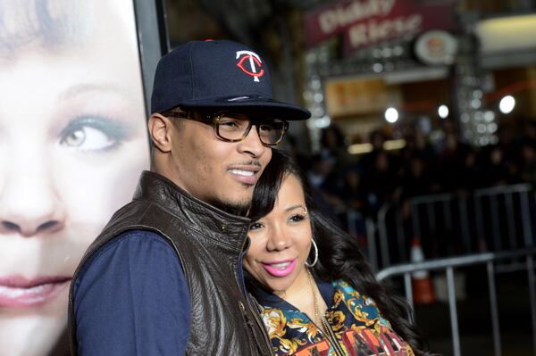 LOS ANGELES, CA - FEBRUARY 04: Actor/rapper T.I. (L) and his wife Tiny arrive at the premiere of Universal Pictures' "Identity Thief" at the Village Theatre on February 4, 2013 in Los Angeles, California. (Photo by Kevin Winter/Getty Images)