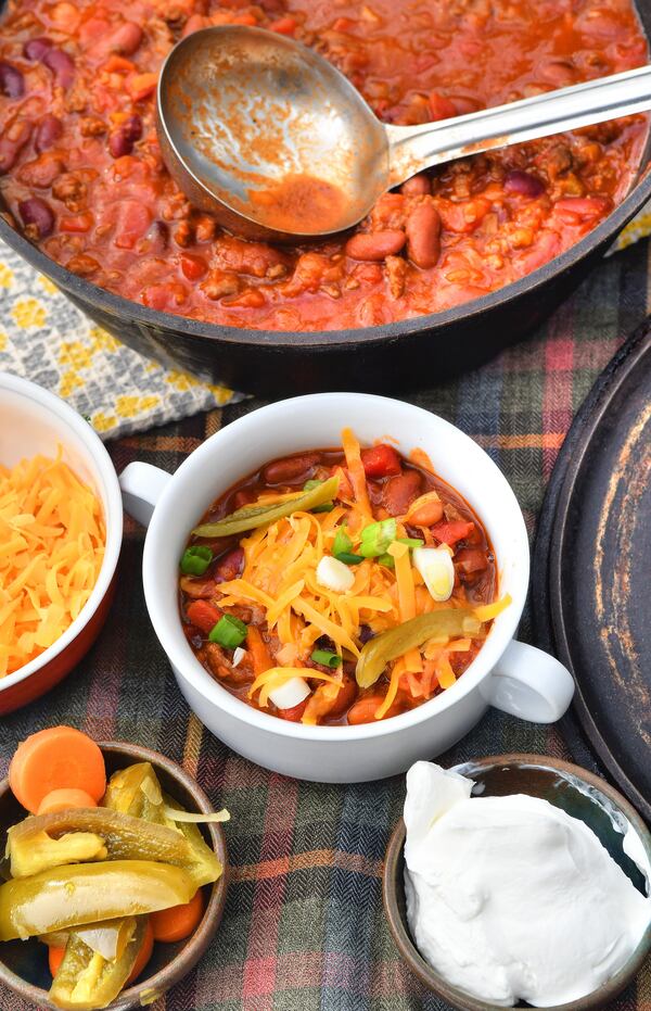 Bloody Mary Chili is a great way to use leftover bloody mary mix. As a rule of thumb: For every 1 pound of ground meat, add one 14 1/2-ounce can of diced tomatoes and two cups of bloody mary mix. This recipe is a loose adaptation of Ohio Farmhouse Sausage Chili, from "The Joy of Cooking." Styling by Wendell Brock / Chris Hunt for the AJC